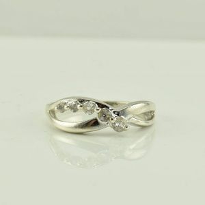 VINTAGE 925SS OTC .1CT CROSSOVER JOURNEY RING